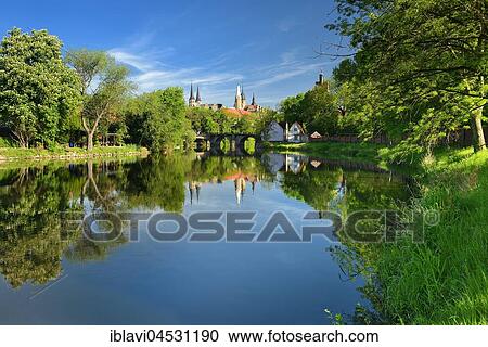 Stock Image - Merseburg Cathedral and Merseburg Castle are reflected in the River Saale, Merseburg, Saxony-Anhalt, Germany, Europe. Fotosearch