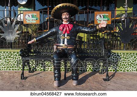Mexican figure on a bank, Los Cabos, Baja California, Mexico, Central America View Large Photo Image Stock Photo - Mexican figure on a bank, Los Cabos, Baja California, Mexico, Central America. Fotosearch