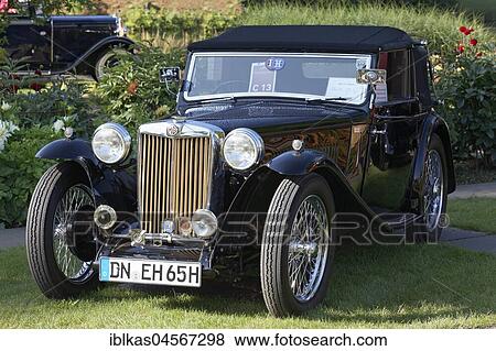 Stock Photo - MG Midget TA Tickford Drop Head Coupé, British Roadster from 1938, Classic Days Dyck Castle, Jüchen, North Rhine-Westphalia, Germany, Europe. Fotosearch