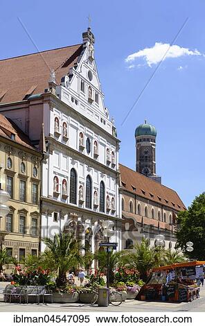 Stock Photography - Michaelskirche and church tower of the cathedral, pedestrian zone, Neuhauser Straße, old town, Munich, Upper Bavaria, Bavaria, Germany, Europe. Fotosearch
