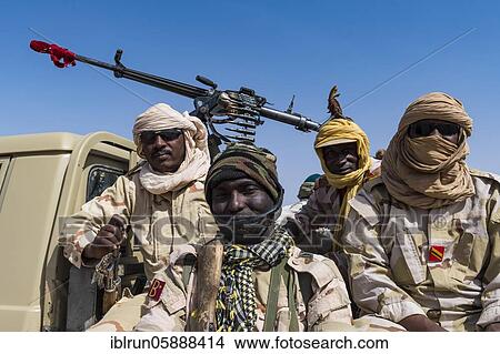 Military escort in the sahel zone near Agadez, Niger, Africa View Large Photo Image Picture - Military escort in the sahel zone near Agadez, Niger, Africa. Fotosearch