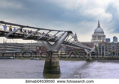 Stock Image - Millennium Bridge across the River Thames with St. Paul's Cathedral, London, England, UK. Fotosearch
