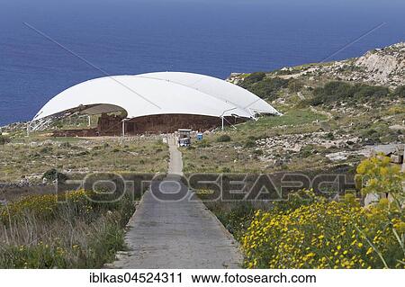 Stock Image - Mnajdra, prehistoric temple complex with canopy, megalithic temple, Qrendi, Malta, Europe. Fotosearch