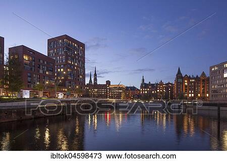 Modern business premises and historic warehouse buildings at dusk, Speicherstadt, Hafencity, Hamburg, Germany, Europe View Large Photo Image Stock Image - Modern business premises and historic warehouse buildings at dusk, Speicherstadt, Hafencity, Hamburg, Germany, Europe. Fotosearch