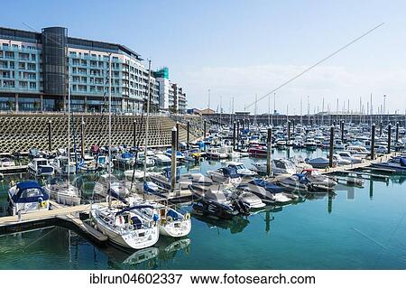 Stock Photo - Modern harbour of St. Helier, Jersey, Channel Islands, United Kingdom, Europe. Fotosearch