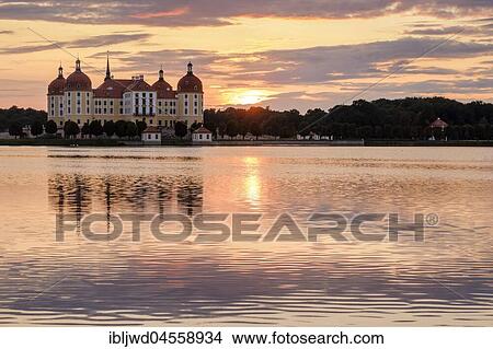 Picture - Moritzburg castle with lake, sunset, Saxony, Germany, Europe. Fotosearch