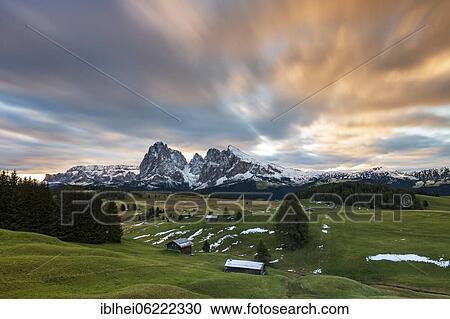 Morning atmosphere on the Alpe di Siusi, alpine huts, Sassolungo, Plattkofel, South Tyrol, Italy, Europe View Large Photo Image Stock Image - Morning atmosphere on the Alpe di Siusi, alpine huts, Sassolungo, Plattkofel, South Tyrol, Italy, Europe. Fotosearch