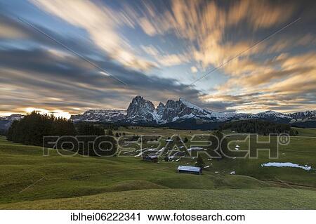 Morning atmosphere on the Alpe di Siusi, alpine huts, Sassolungo, Plattkofel, South Tyrol, Italy, Europe View Large Photo Image Stock Image - Morning atmosphere on the Alpe di Siusi, alpine huts, Sassolungo, Plattkofel, South Tyrol, Italy, Europe. Fotosearch