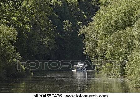 Stock Photograph - Motor yacht on the Lahn near Nassau, Rhineland-Palatinate, Germany, Europe. Fotosearch