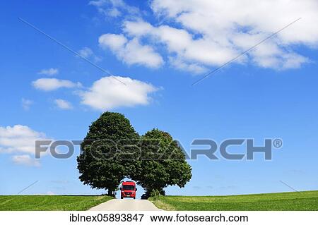 Motorhome on picture book country road near Berg, Starnberger See, Upper Bavaria, Bavaria, Germany, Europe View Large Photo Image Stock Photo - Motorhome on picture book country road near Berg, Starnberger See, Upper Bavaria, Bavaria, Germany, Europe. Fotosearch