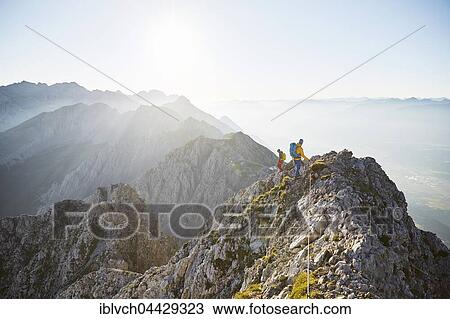 Mountain climbing, two climbers secured to steel cable, Inn Valley, Inntal Chain, Tyrol, Austria, Europe View Large Photo Image Stock Image - Mountain climbing, two climbers secured to steel cable, Inn Valley, Inntal Chain, Tyrol, Austria, Europe. Fotosearch