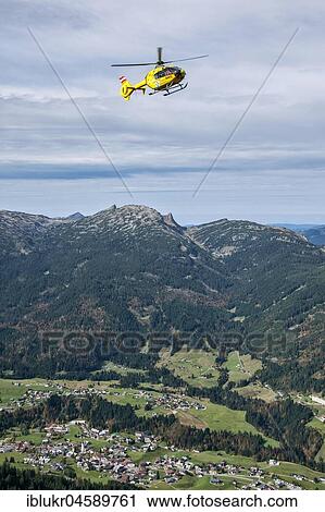 Stock Image - Mountain rescue by helicopter on the Fellhorn ridge, Kleinwalsertal, Kleinwalsertal, Riezlern, Vorarlberg, Austria, Europe. Fotosearch