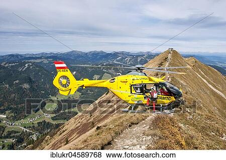 Mountain rescue by helicopter on the Fellhorn ridge, Kleinwalsertal, Riezlern, Vorarlberg, Austria, Europe View Large Photo Image Stock Photo - Mountain rescue by helicopter on the Fellhorn ridge, Kleinwalsertal, Riezlern, Vorarlberg, Austria, Europe. Fotosearch