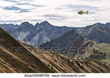 Mountain rescue by helicopter on the Fellhorn ridge, Kleinwalsertal, Riezlern, Vorarlberg, Austria, Europe View Large Photo Image Stock Photography - Mountain rescue by helicopter on the Fellhorn ridge, Kleinwalsertal, Riezlern, Vorarlberg, Austria, Europe. Fotosearch