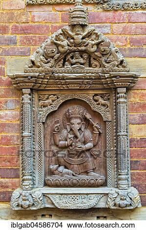 Picture - Mul Chowk courtyard, Wall carved Statues, Hanuman Dhoka Royal Palace, Patan Durbar Square, Unesco World Heritage Site, Kathmandu valley, Lalitpur, Nepal, Asia. Fotosearch