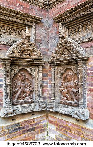 Stock Image - Mul Chowk courtyard, Wall carved Statues, Hanuman Dhoka Royal Palace, Patan Durbar Square, Unesco World Heritage Site, Kathmandu valley, Lalitpur, Nepal, Asia. Fotosearch