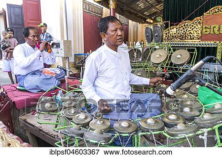 Musician at the Temple Festival in the Shwezigon Pagoda, Bagan, Myanmar, Asia, Bagan, Myanmar, Asia View Large Photo Image Stock Photo - Musician at the Temple Festival in the Shwezigon Pagoda, Bagan, Myanmar, Asia, Bagan, Myanmar, Asia. Fotosearch
