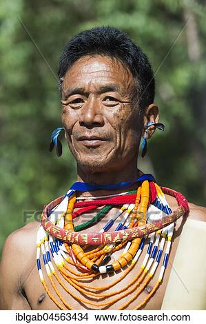 Naga tribal man in traditional outfit, Kisima Nagaland Hornbill festival, Kohima, Nagaland, India, Asia View Large Photo Image Picture - Naga tribal man in traditional outfit, Kisima Nagaland Hornbill festival, Kohima, Nagaland, India, Asia. Fotosearch