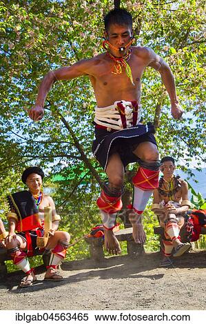 Naga tribal man in traditional outfit performing a warrior dance, Kisima Nagaland Hornbill festival, Kohima, Nagaland, India, Asia View Large Photo Image Stock Photography - Naga tribal man in traditional outfit performing a warrior dance, Kisima Nagaland Hornbill festival, Kohima, Nagaland, India, Asia. Fotosearch