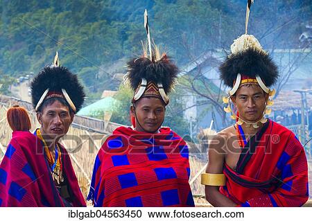 Stock Image - Naga tribal men in traditional clothing, Kisima Nagaland Hornbill festival, Kohima, Nagaland, India, Asia. Fotosearch