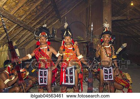 Stock Image - Naga tribal men in traditional clothing, Kisima Nagaland Hornbill festival, Kohima, Nagaland, India, Asia. Fotosearch
