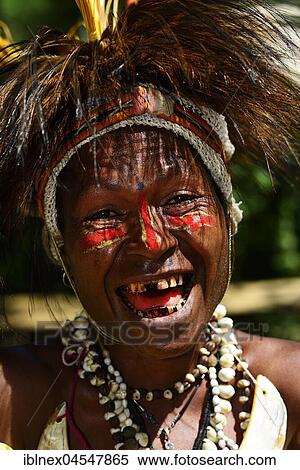 Stock Photography - Native American, Simbu tribe, laughing, Portrait, Hagareto Village, Goroka, Highlands, Papua New Guinea, Oceania. Fotosearch