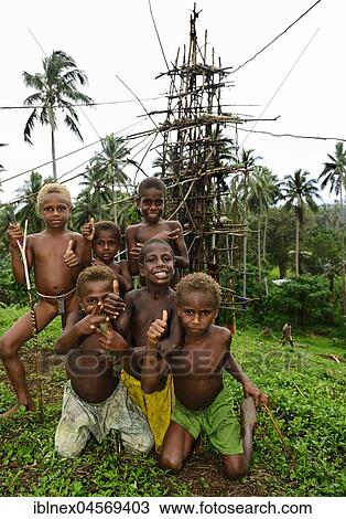 Stock Image - Native children posing, Wali Village, Pentecost Island, Vanuatu, South Seas, Oceania. Fotosearch