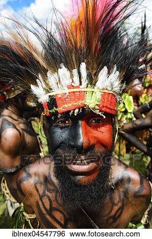 Stock Photograph - Native of the Highland Tribes, Sandhown Warriors, portrait, Sing-Sing Festival, Goroka, Papua New Guinea, Oceania. Fotosearch