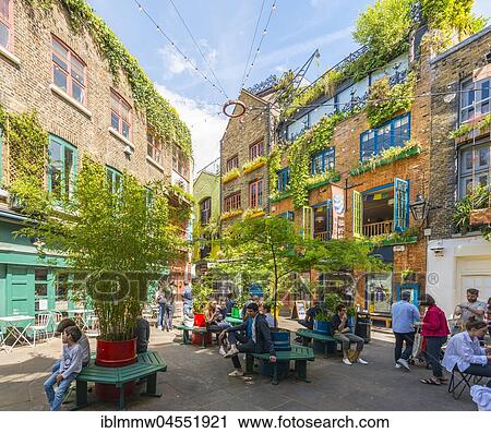 Stock Image - Neil's Yard, food stands in courtyard, London, England, United Kingdom, Europe. Fotosearch