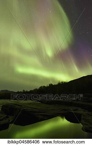 Northern lights over the river Aisko in Abisko National Park, Sweden, Europe View Large Photo Image Stock Photograph - Northern lights over the river Aisko in Abisko National Park, Sweden, Europe. Fotosearch