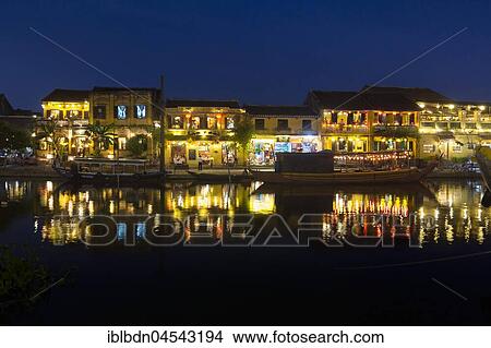 Picture - Old city by night, River Thu Bon at front, Hoi An, Vietnam, Asia. Fotosearch