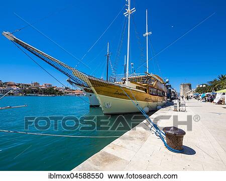 Old sailing schooner on the Riva Promenade, Old Town Trogir, UNESCO World Heritage Site, Region Split, Middle Dalmatia, Dalmatia, Adriatic Coast, Croatia, Europe View Large Photo Image Stock Image - Old sailing schooner on the Riva Promenade, Old Town Trogir, UNESCO World Heritage Site, Region Split, Middle Dalmatia, Dalmatia, Adriatic Coast, Croatia, Europe. Fotosearch