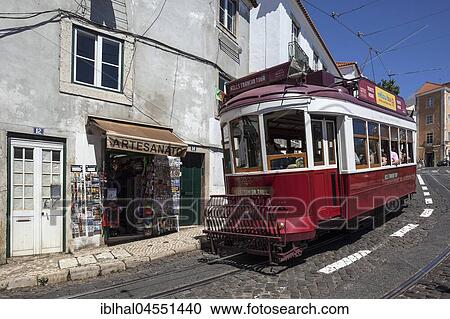 Stock Image - Old tram, Old Town quarter of Alfama, Lisbon, Portugal, Europe. Fotosearch