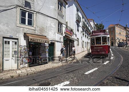 Old tram, Old Town quarter of Alfama, Lisbon, Portugal, Europe View Large Photo Image Stock Photography - Old tram, Old Town quarter of Alfama, Lisbon, Portugal, Europe. Fotosearch