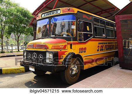 Stock Photography - Older public bus to bus station, Ciudad del Este, Alto Paraná, Paraguay, South America. Fotosearch