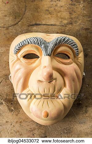 Painted wooden mask on a workbench, wooden mask carver, Bad Aussee, Styria, Austria, Europe View Large Photo Image Stock Image - Painted wooden mask on a workbench, wooden mask carver, Bad Aussee, Styria, Austria, Europe. Fotosearch