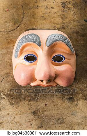 Painted wooden mask on a workbench, wooden mask carver, Bad Aussee, Styria, Austria, Europe View Large Photo Image Stock Image - Painted wooden mask on a workbench, wooden mask carver, Bad Aussee, Styria, Austria, Europe. Fotosearch