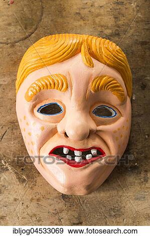 Painted wooden mask on a workbench, wooden mask carver, Bad Aussee, Styria, Austria, Europe View Large Photo Image Stock Photo - Painted wooden mask on a workbench, wooden mask carver, Bad Aussee, Styria, Austria, Europe. Fotosearch