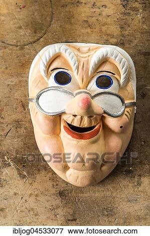 Painted wooden mask on a workbench, wooden mask carver, Bad Aussee, Styria, Austria, Europe View Large Photo Image Stock Photo - Painted wooden mask on a workbench, wooden mask carver, Bad Aussee, Styria, Austria, Europe. Fotosearch