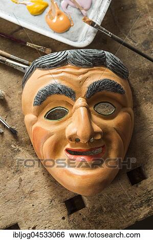 Painted wooden mask on a workbench, wooden mask carver, Bad Aussee, Styria, Austria, Europe View Large Photo Image Stock Photograph - Painted wooden mask on a workbench, wooden mask carver, Bad Aussee, Styria, Austria, Europe. Fotosearch