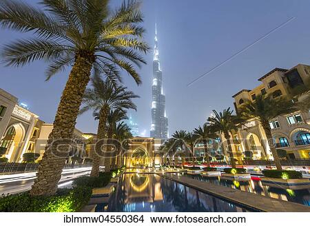Picture - Palm trees and fountains, Burj Khalifa, blue hour, Dubai, Emirate Dubai, United Arab Emirates, Asia. Fotosearch