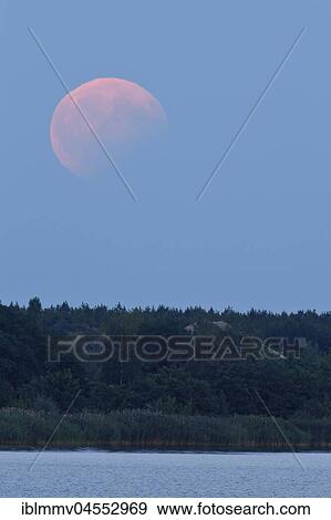Partial lunar eclipse on 07/08/2017, Biosphere Reserve Mittlere Elbe, Saxony-Anhalt, Germany, Europe View Large Photo Image Stock Photo - Partial lunar eclipse on 07/08/2017, Biosphere Reserve Mittlere Elbe, Saxony-Anhalt, Germany, Europe. Fotosearch
