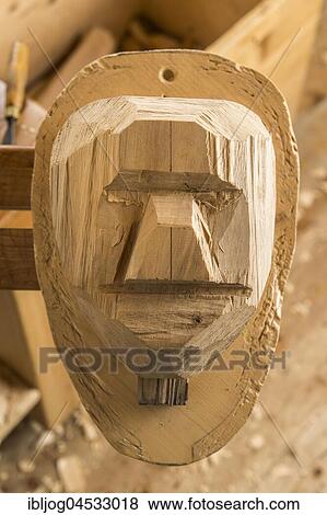 Partially shaped wooden block fixed on a workbench, unfinished wooden mask carver, wooden mask carver, Bad Aussee, Styria, Austria, Europe View Large Photo Image Stock Photo - Partially shaped wooden block fixed on a workbench, unfinished wooden mask carver, wooden mask carver, Bad Aussee, Styria, Austria, Europe. Fotosearch