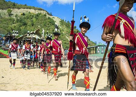 Stock Image - Participant parade at the Hornbill Festival, Kohima, Nagaland, India, Asia. Fotosearch