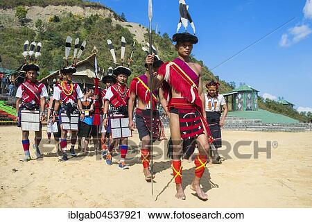 Stock Image - Participant parade at the Hornbill Festival, Kohima, Nagaland, India, Asia. Fotosearch