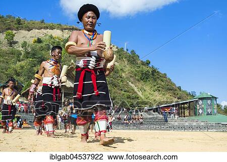 Stock Image - Participant parade at the Hornbill Festival, Kohima, Nagaland, India, Asia. Fotosearch