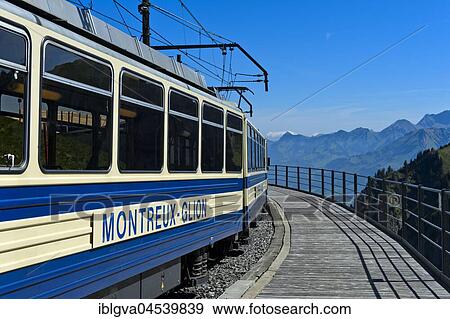 Passenger carriage of the Montreux-Glion-Les-Rochers-de-Naye cog railway, GoldenPass line, Jaman station, Montreux, Vaud, Switzerland, Europe View Large Photo Image Stock Photo - Passenger carriage of the Montreux-Glion-Les-Rochers-de-Naye cog railway, GoldenPass line, Jaman station, Montreux, Vaud, Switzerland, Europe. Fotosearch