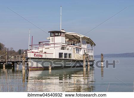 Stock Image - Passenger ship Tutzing at a jetty, European Starnberger See, Upper Bavaria, Bavaria, Germany, Europe. Fotosearch