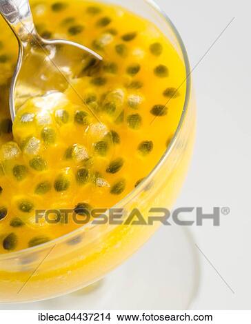 Passion fruit and mango mousse in dessert bowl, close-up View Large Photo Image Picture - Passion fruit and mango mousse in dessert bowl, close-up. Fotosearch