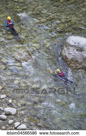 People canyoning in the Gorges du Verdon, Provence-Alpes-Cote d'Azur, Provence, France, Europe View Large Photo Image Stock Photograph - People canyoning in the Gorges du Verdon, Provence-Alpes-Cote d'Azur, Provence, France, Europe. Fotosearch